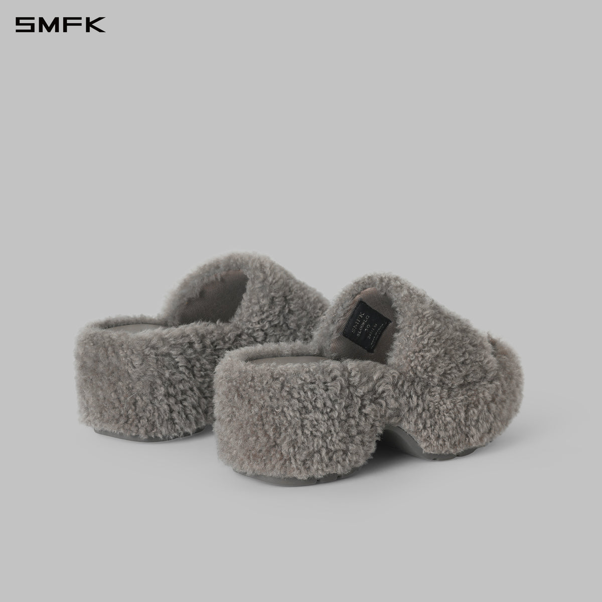PRISM WORLD SHEARLING HEELED SLIDES