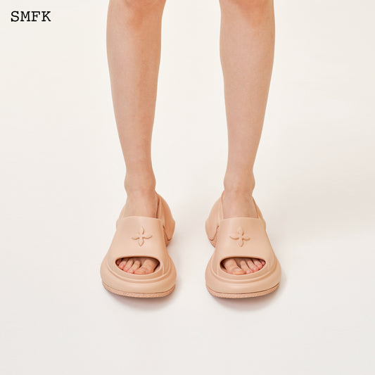 COMPASS WAVE HIGH-HEEL BUMPER SANDAL IN NUDE