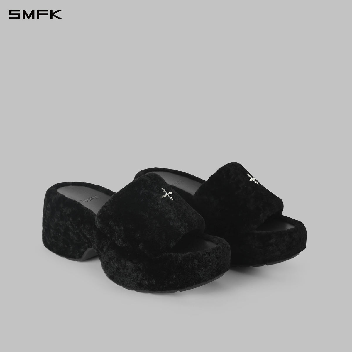 PRISM WORLD SHEARLING HEELED SLIDES