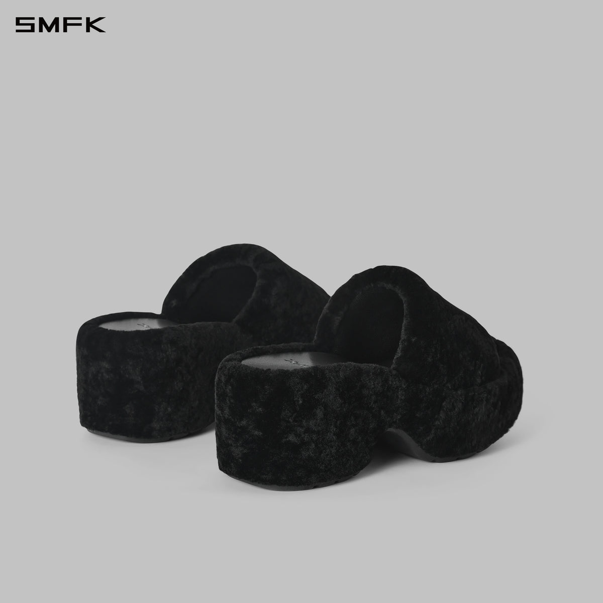 PRISM WORLD SHEARLING HEELED SLIDES
