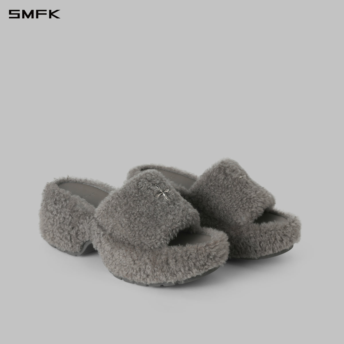 PRISM WORLD SHEARLING HEELED SLIDES