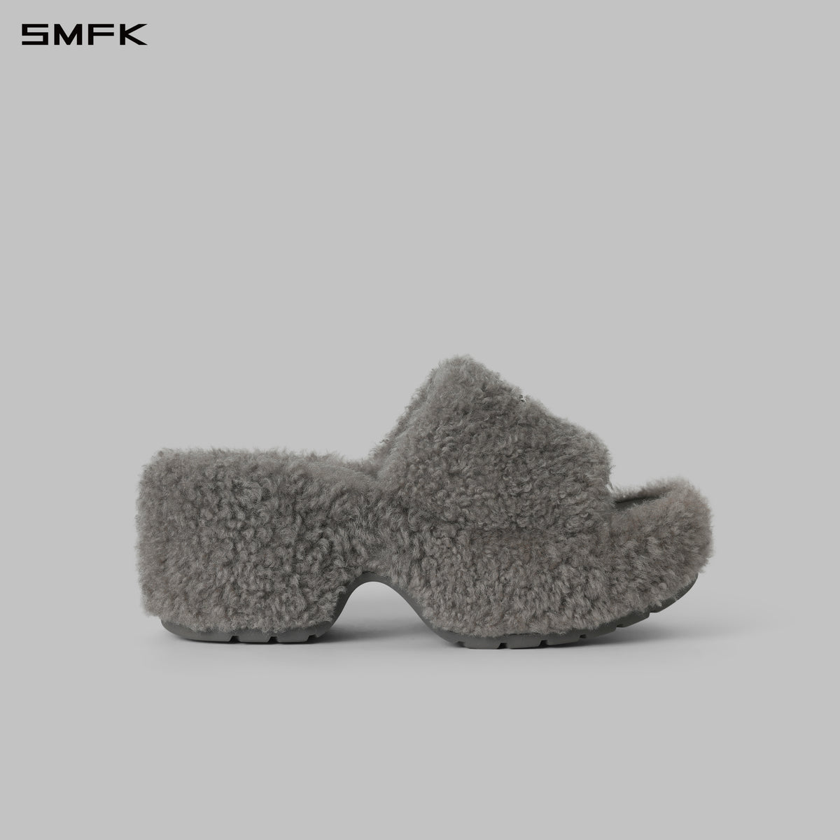 PRISM WORLD SHEARLING HEELED SLIDES