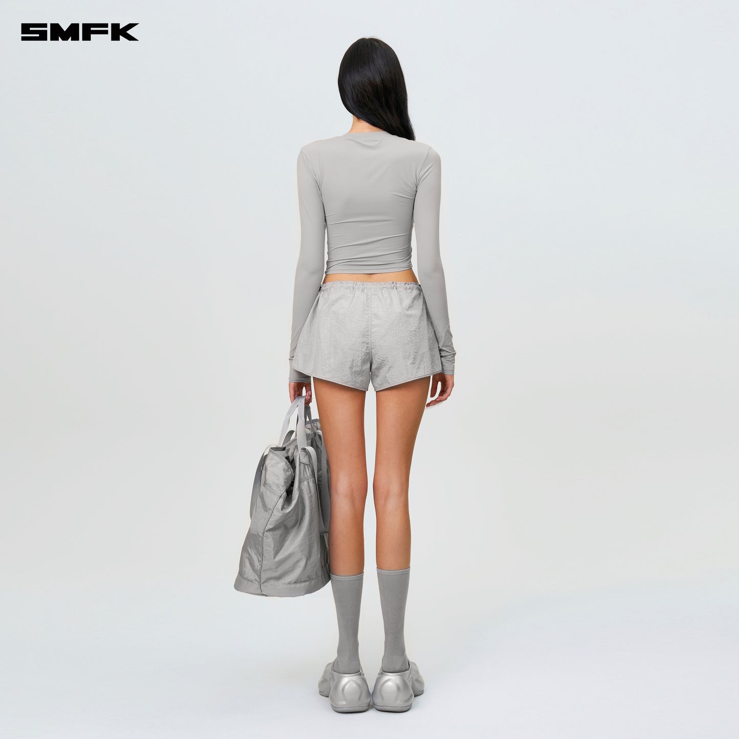 Compass Hug Hug Skin Slimming Top Dusty Gray