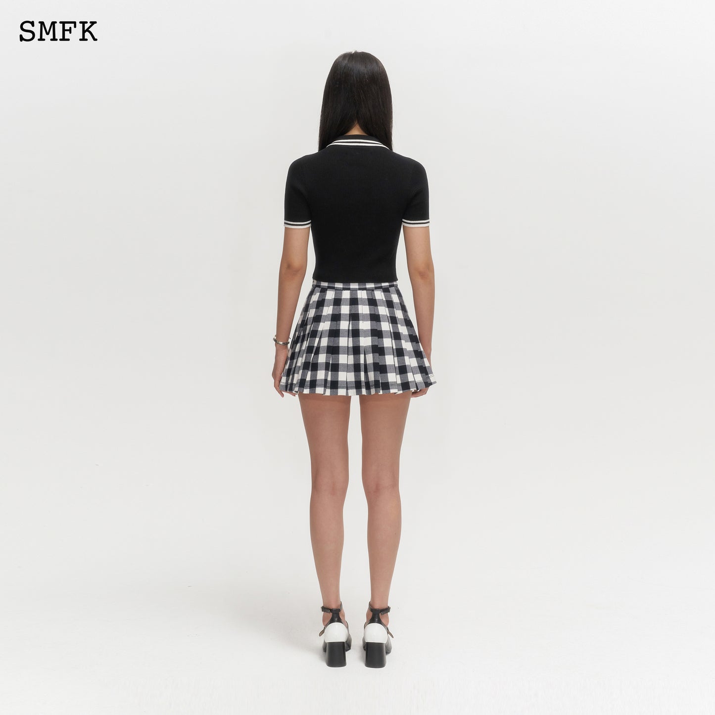 GRASSLAND BLACK AND WHITE CHECKERED PLEATED SKIRT