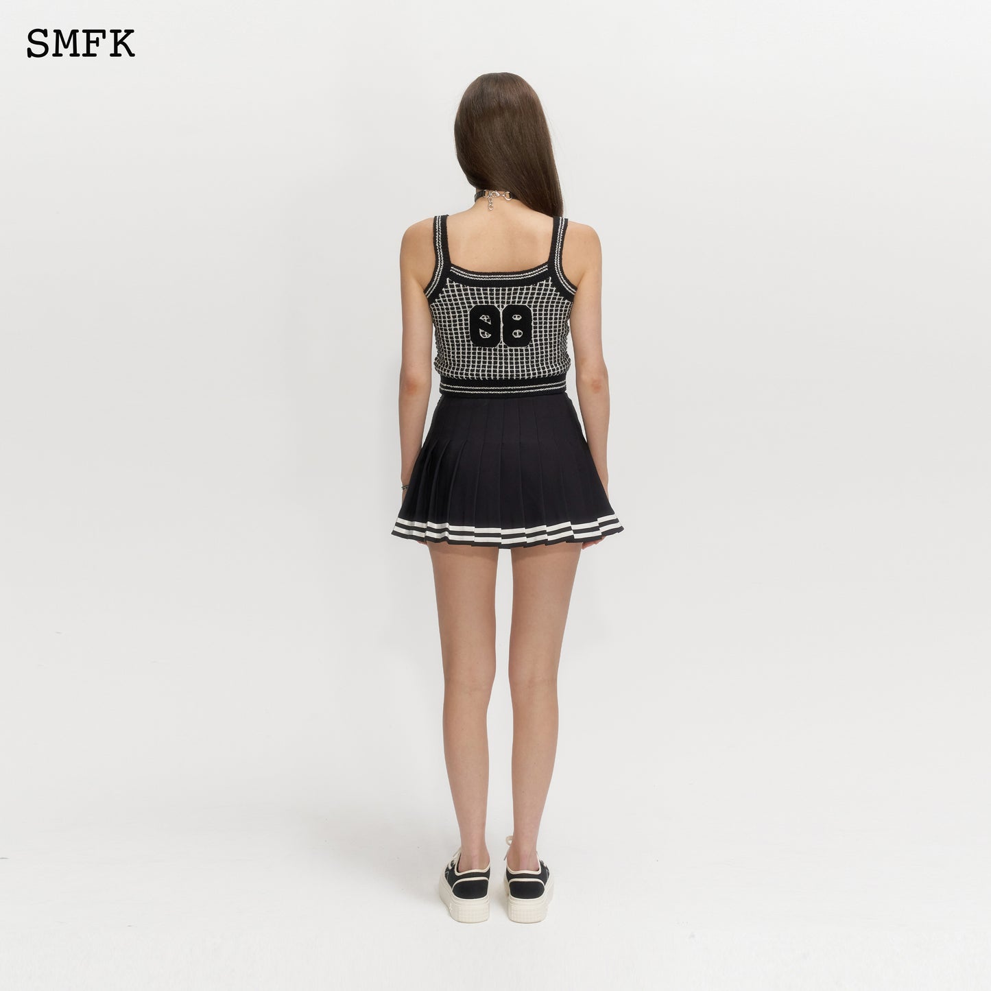 COMPASS RETRO BLACK AND WHITE CHECKERED SPORT VEST